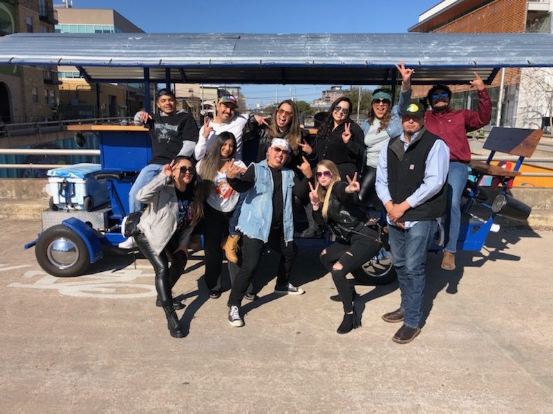 A dressed-up race-week crew at the Austin Bar Bike meet point