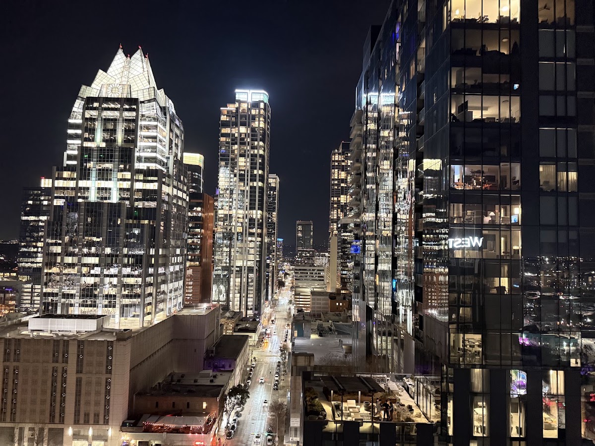 Rooftop pool deck and downtown skyline view from Azul Rooftop on the 20th floor of the Westin Austin Downtown