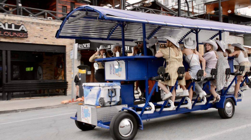 Group celebrating on the party bike