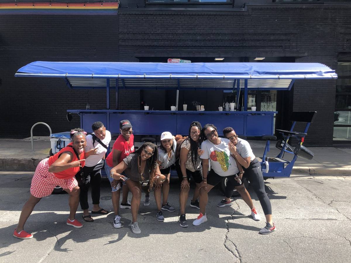 A group celebrating between bar stops