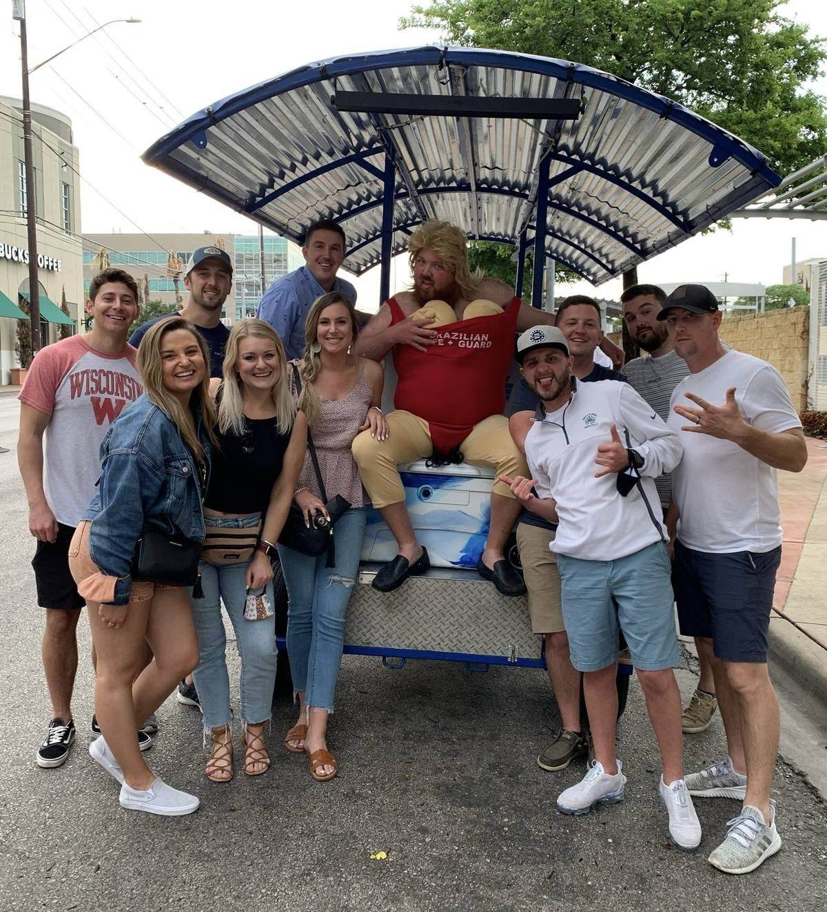 Cheersing on the party bike in downtown Austin