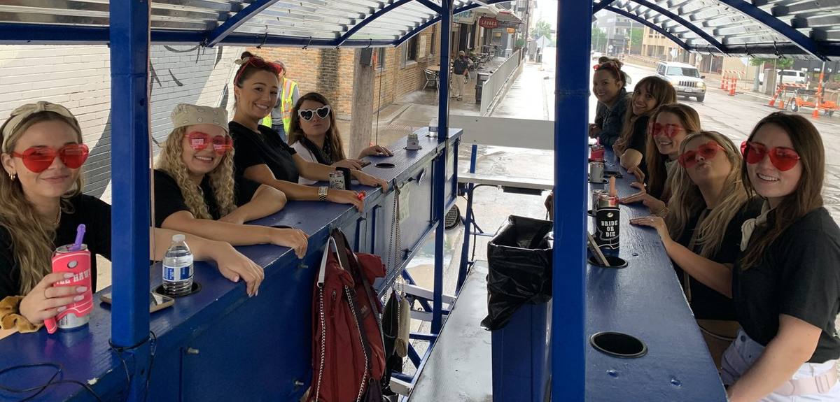 A bachelorette party rolling through Austin at night