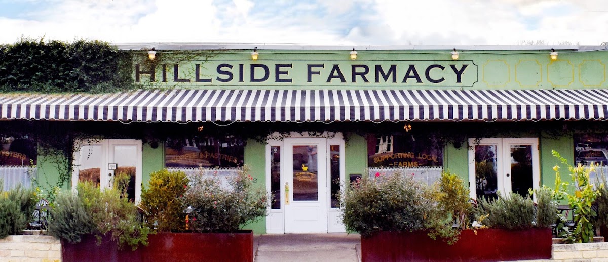 Brunch service inside the historic drugstore dining room at Hillside Farmacy in East Austin