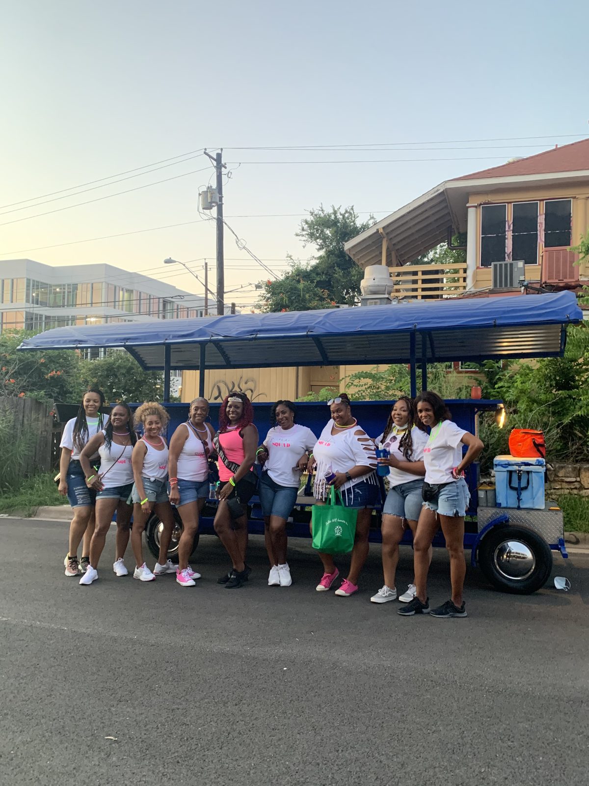 A full group rolling on the electric Austin Bar Bike through downtown Austin