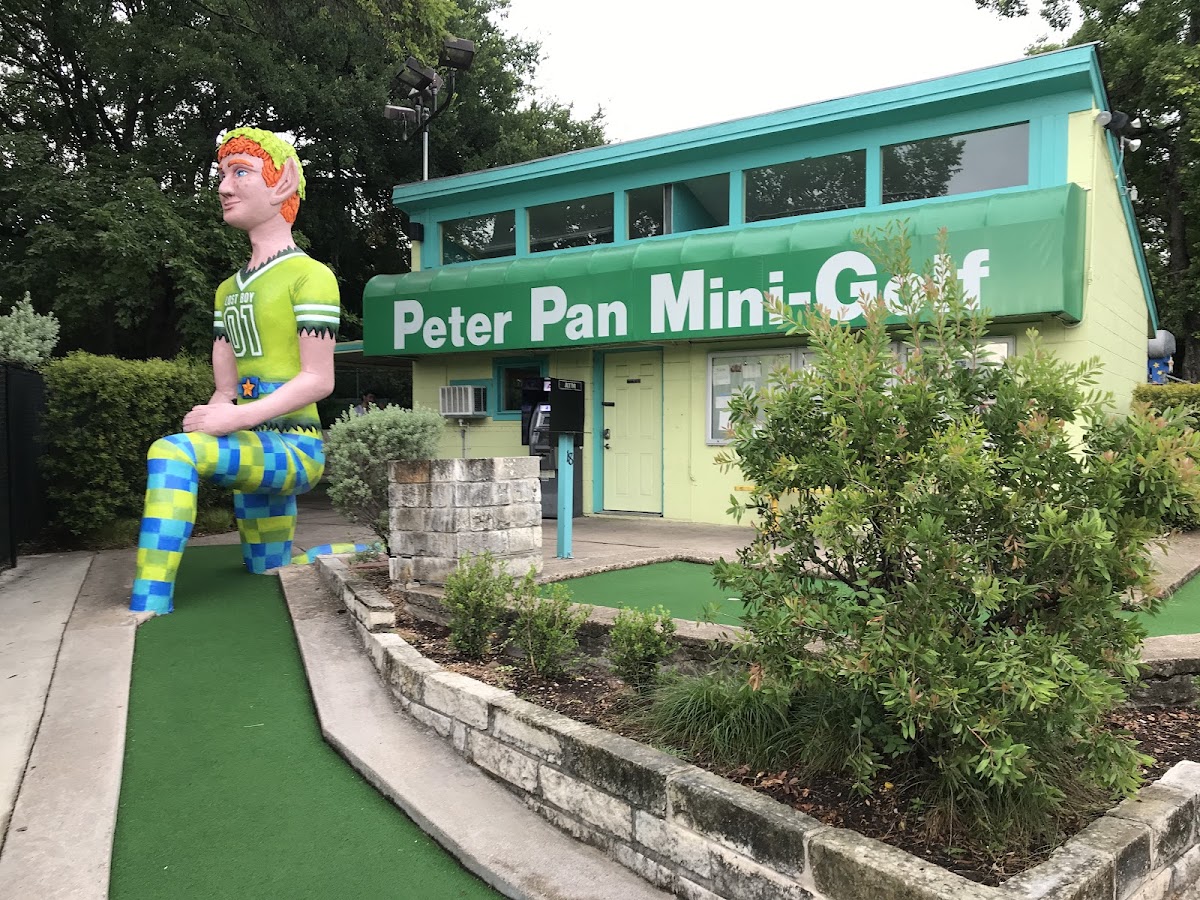 The giant Peter Pan statue and vintage putting greens at Peter Pan Mini Golf near Barton Springs Road in Austin