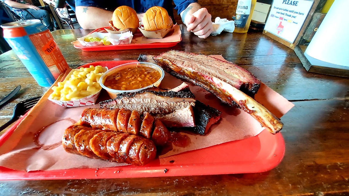 Loaded tray of brisket, beef ribs, sausage and mac and cheese at Terry Black's Barbecue in Austin