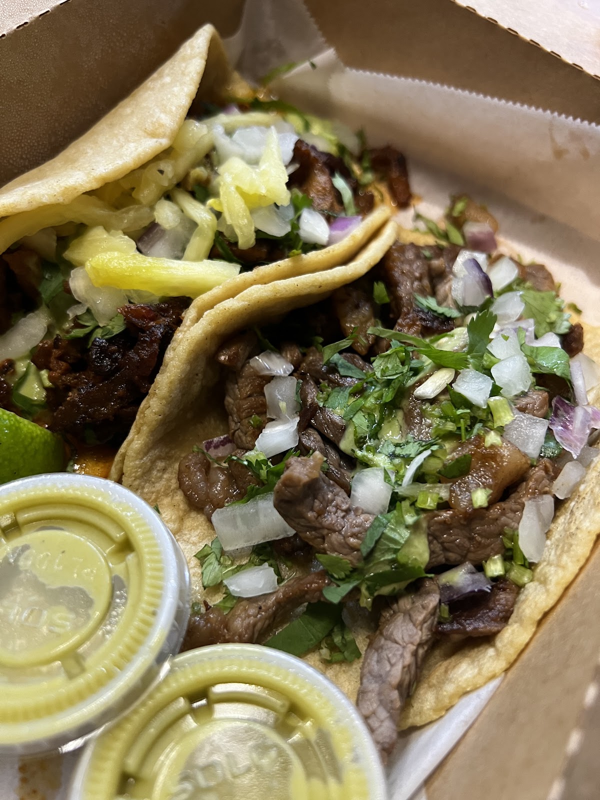 Breakfast tacos on homemade corn tortillas at Vaquero Taquero near the UT campus in Austin
